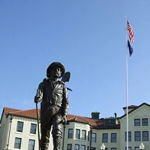 Statue of prospector William Skagway Bill Fonda in front of the Alaska Pioneers Home
