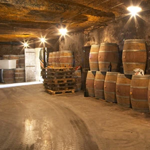 The underground winery and cellar in an old stone quarry, Chateau Belair (Bel Air) 1st