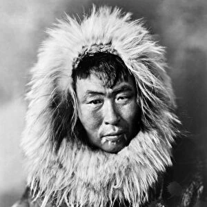 ALASKA: ESKIMO MAN, c1926. An Eskimo man wearing traditional fur clothing, Alaska