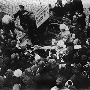 BERLIN: SOUP KITCHEN. A crowd of people buying goulash, supplied by the Berliner Volkskuchen