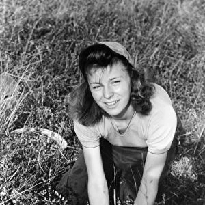 BERRY PICKER, 1938. Girl picking cranberries in Burlington County, New Jersey