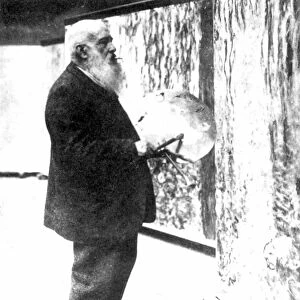 CLAUDE MONET (1840-1926). French painter. Photographed in his studio, 1920