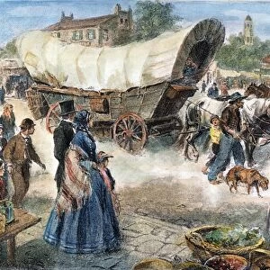 CONESTOGA WAGON, 1850s. Headed west along the National (Cumberland) Road in the 1850s