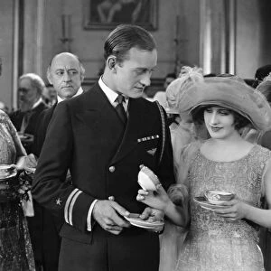 EXCUSE ME, 1925. Conrad Nagel and Norma Shearer in a scene from the film