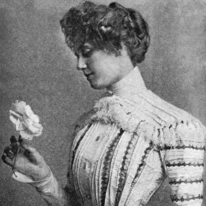 FASHION: SHIRTWAIST, 1900. A ladies shirt waist of pink silk with lace-edged tucks