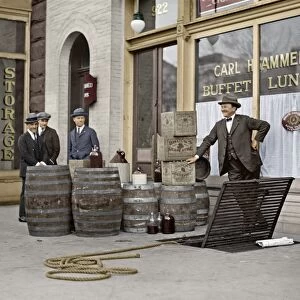 LIQUOR RAID, 1923. Prohibition officers with beer and wine recovered during a raid
