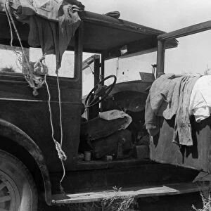 MIGRANT AUTOMOBILE, 1936. An automobile in New Mexicio, carrying the belongings