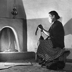 NEW MEXICO: SPINNING, 1943. Maclovia Lopez, wife of Mayor Juan Lopez of Trampas