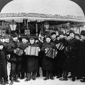 RUSSIAN MUSICIANS, c1919. Musicians performing at a Russian carnival, Petrograd, Soviet Union