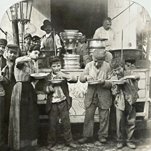 SPAGHETTI VENDOR, c1908. Spaghetti vendor serving food in Naples, Italy. Photograph