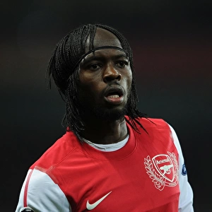 Arsenal's Dominant Display: Gervinho Scores in 3-0 UEFA Champions League Victory over AC Milan
