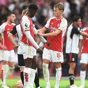 Arsenal's Martin Odegaard and Eddie Nketiah Share a Moment during Arsenal vs. Fulham (2023-24)