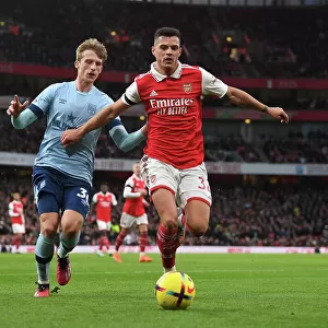 Arsenal's Xhaka Clashes with Brentford's Roerslev in Premier League Showdown