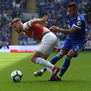 Clarke vs. Xhaka: Cardiff's Camarasa Challenges Arsenal's Ramsey in Premier League Clash