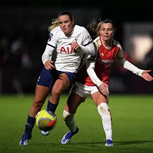 Clash of the Titans: Grace Clinton and Noelle Maritz Fight for Possession in Arsenal vs. Tottenham Women's FA WSL Cup Match