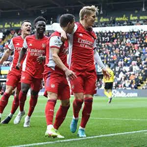Martin Odegaard and Team Celebrate First Goal: Arsenal's Victory at Watford (2021-22)