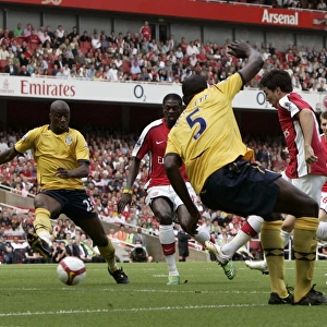 Samir Nasri scores Arsenals goal past Abdoulaye Meite (WBA)