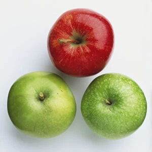 Three apples, one red, two green