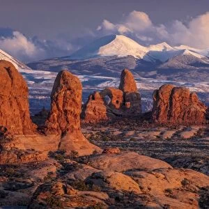 Arches National Park, Utah at sunset with LaSalle snowcapped Mountains in distant view - winter