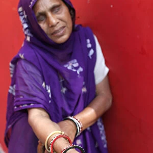 Blind beggar in a Hindu temple in New Delhi
