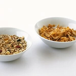 Bowl of muesli and bowl of cornflakes