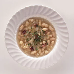 Bowl of Senate Bean Soup made with beans, onions and ham, a traditional dish from Washington DC, view from above