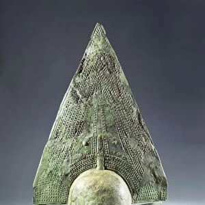 Bronze helmet used as funerary urn lid, from ancient Veii, Latium region