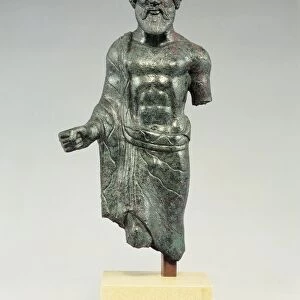 Bronze statue depicting Tinia (Greek Zeus), 5th century b. C. from Populonia, Livorno province, Italy