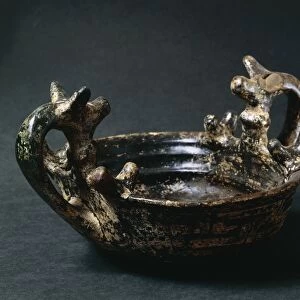 Ceramic vessel with zoomorphic handles, from Grottazzolina, province of Fermo