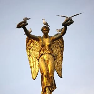 Chatelet column statue, angel holding two crowns, Paris, France