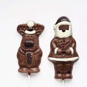 Chocolate Santa and reindeer lollies, close-up