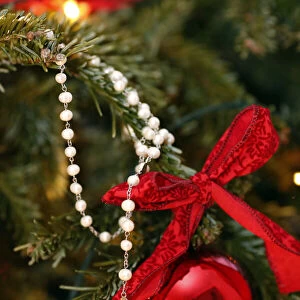 Christmas tree with decorations and prayer beads