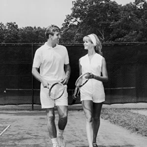 Couple on the tennis court