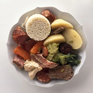 Cozido a Portuguesa, platter of mixed meats, sausages, vegetables and rice, a traditional dish from Tras-os-Montes, Portugal, view from above