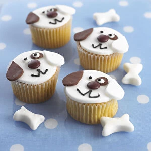 Cupcakes decorated to look like dogs