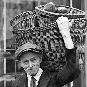 Delivering Baskets Of Bread