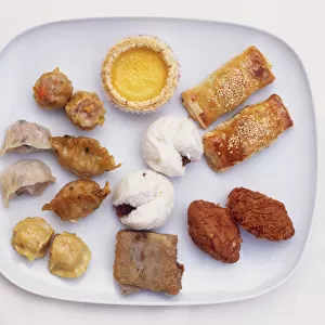 Dim sum, Cantonese-style parcels of food popular in Singapore, including egg tart, steamed pork dumpling, steamed prawn dumpling, fried pork dumpling, pork pastry, yam pastry, carrot cake, Char siew pau, meaning minced pork bun, and minced pork pastry