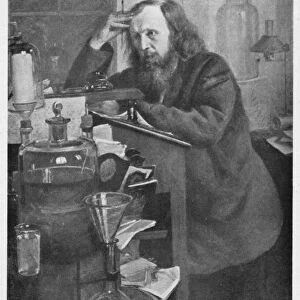Dmitiri Ivanovich Mendeleyev (1834-1907), Russian chemist. Working at his desk