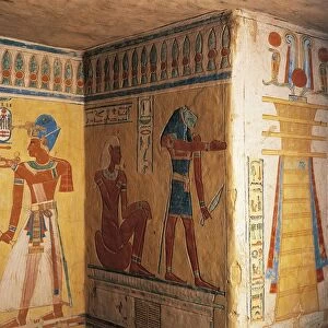 Egypt, Luxor, Ancient Thebes, Valley of Queens, Khaemuasets tomb, painted relief depicting naked youth (The Great God Herymaat) seated on cushion and before him lion-headed Nebnery
