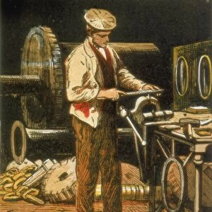 The Engineer using a file on an engine part held in a vise. Engineers made and maintained