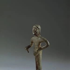 Etruscan bronze figure of offering man, 7th Century B. C
