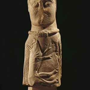 France, Euffigneix, Sculpture representing a God wearing a torque and holding a wild boar