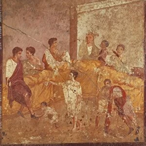 Fresco depicting a triclinium scene from Pompeii, Italy