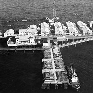 Housing built at neftyanye kamni (oil rocks), an oil workers settlement on the caspian sea in azerbaijan, ussr, february 1969, a park for the workers is in the foreground