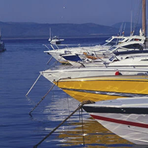 Italy, Southern Tuscany, Monte Argentario, Porto Ercole, yachts moored in marina of harbour town, bow sections