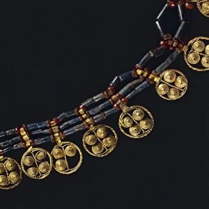 Lapislazuli and carnelian necklace with gold pendants, from Ur, Iraq