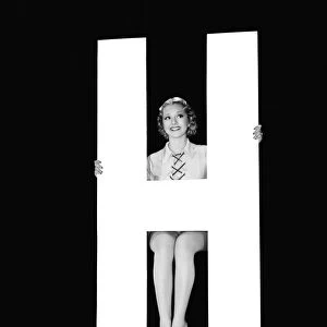 The Letter H And A Woman
