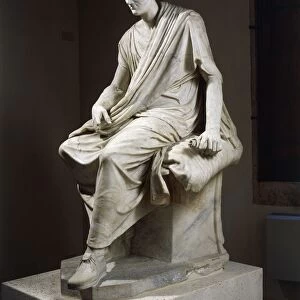 Marble statue of seated togaed man