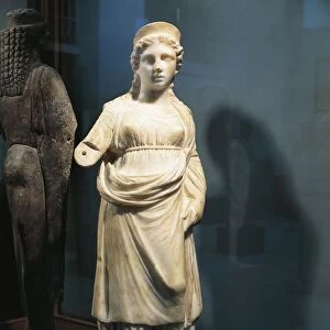 Marble statuette of Isis, from Saqqara