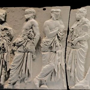 Parthenon frieze depicting four men